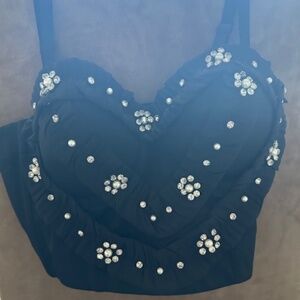 NWOT black bustier with pearl and rhinestone accents.